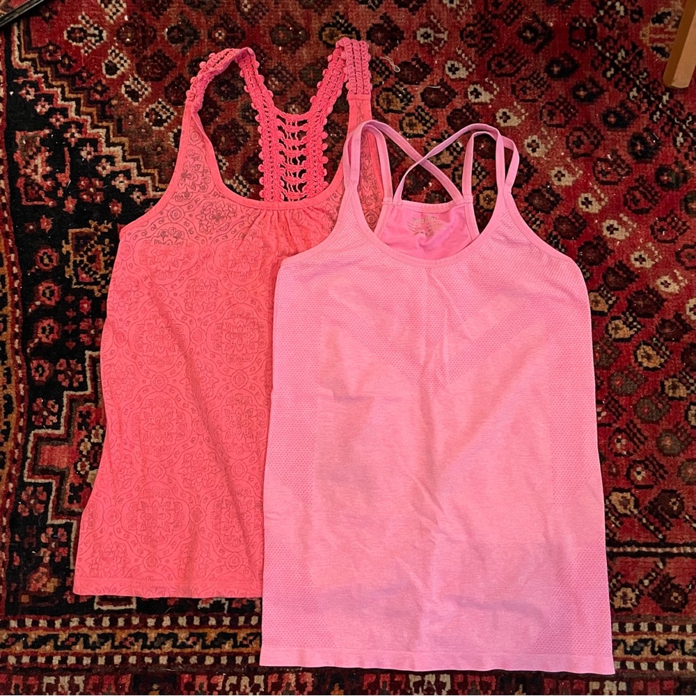 🛍️ Two hot pink racerback tank tops